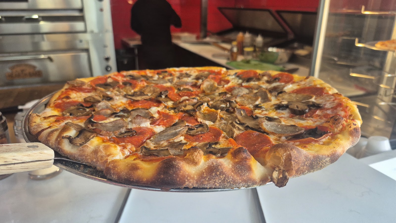 Salad and pizza spread at Fathead Pizza